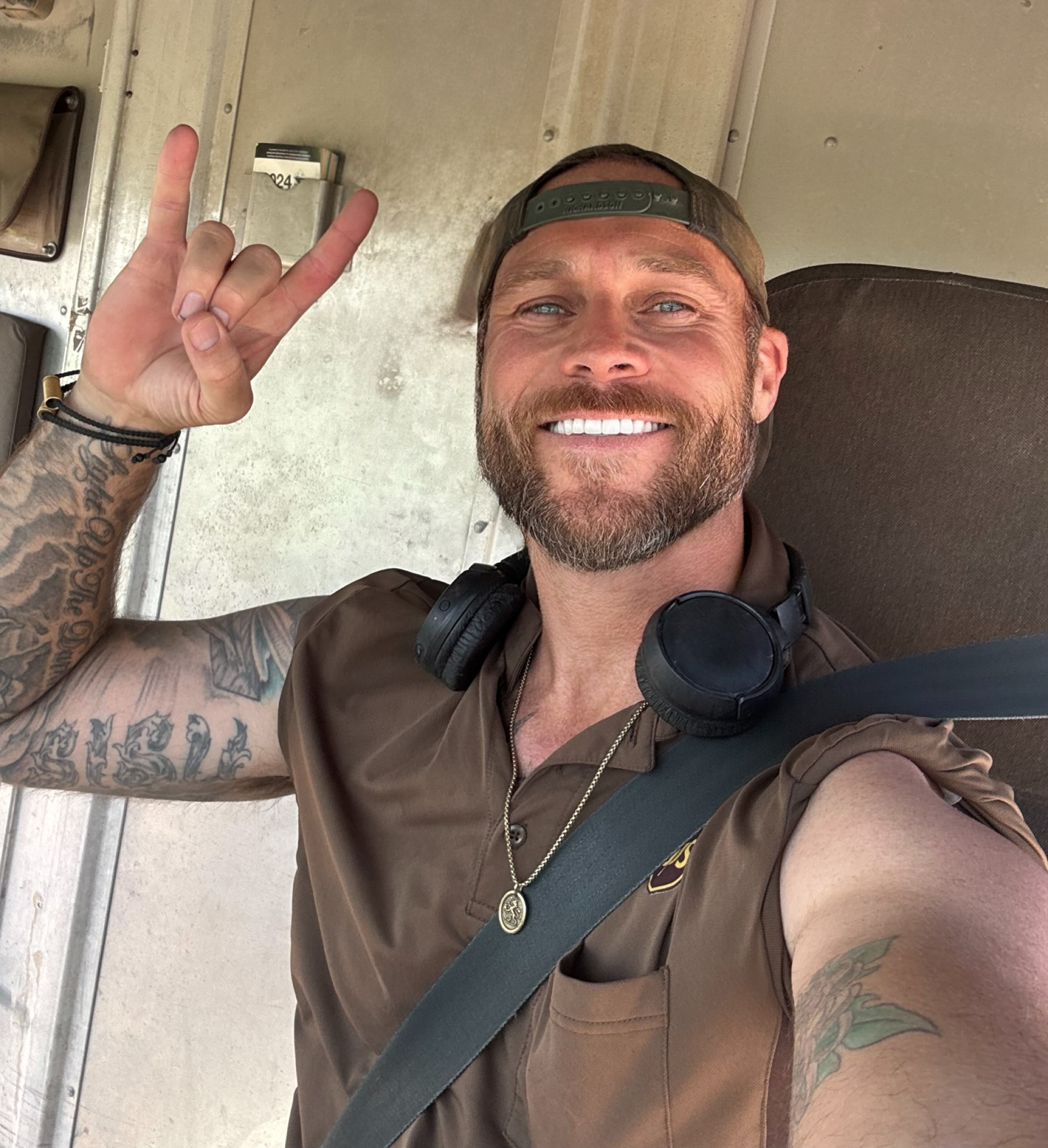 Russell Butler waving in UPS truck